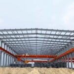 And Basic skeletal steel based tent like structure with red and grey colours